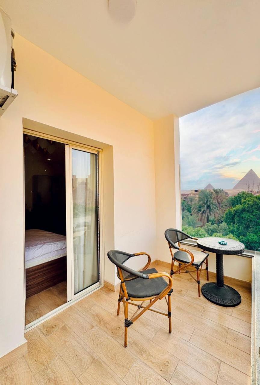 Sphinx Gate Pyramids View